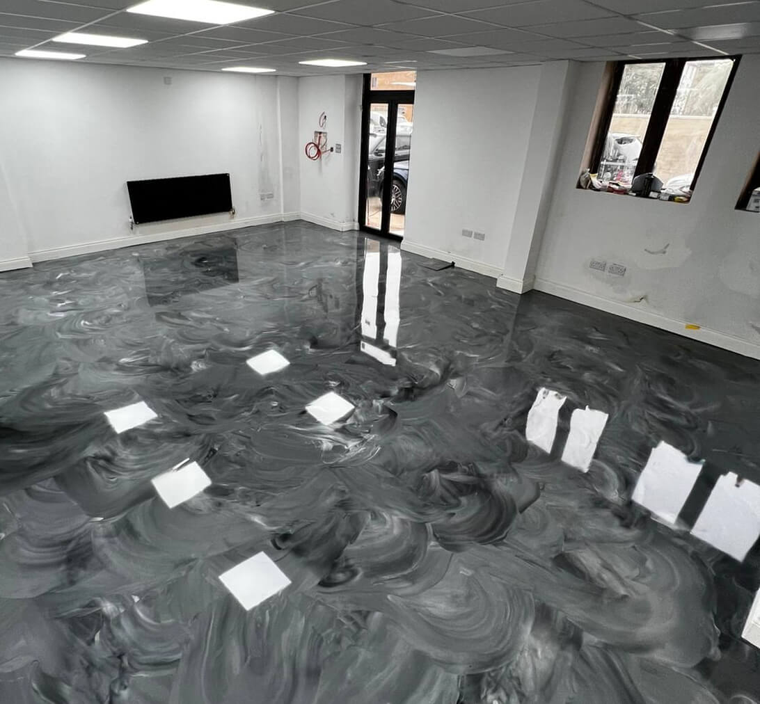Modern garage with glossy epoxy flooring